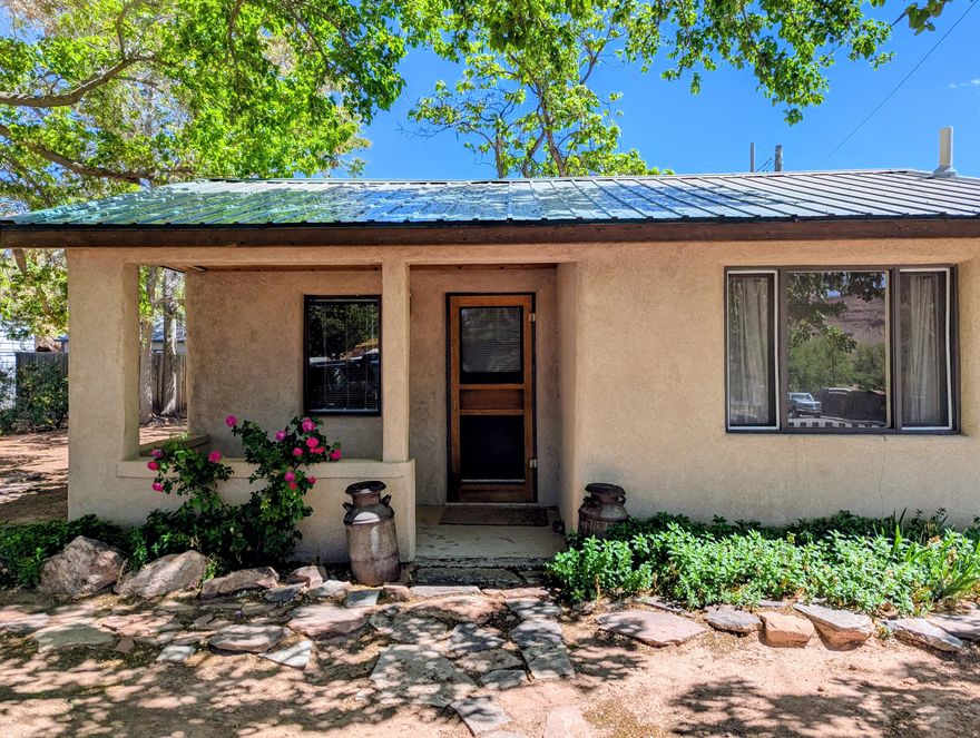 Looking for a Getaway to Moab, UT? We just listed a jewel of a property. This cute completely furnished Cottage Bungalow is in town and has plenty of possibilities. Walk to town, restaurants, and stores. Go biking and hiking out your back door. Also, if you are looking for a business location, this will work for a neighborhood zone C5. It has been updated with newer metal roof and stucco exterior. Property is being sold "as-is condition".