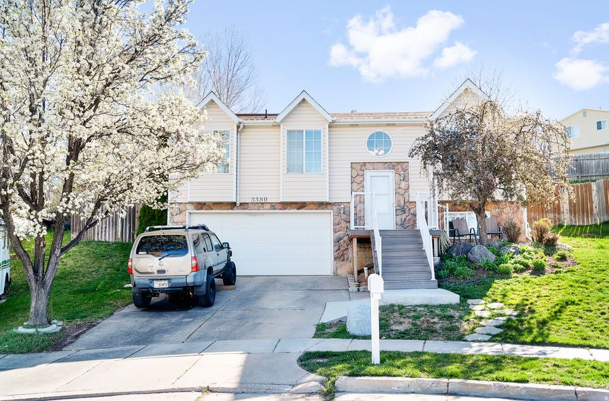 Welcome to this beautiful Layton home, offering the perfect blend of comfort, space, and versatility. Situated on a generous lot, this 4-bedroom, 3-bath property is designed for both everyday living and effortless entertaining. The thoughtfully designed layout provides spacious living areas that flow seamlessly together, creating a warm and inviting atmosphere throughout. Large windows fill the home with natural light, enhancing the open feel and highlighting each space. Step outside to a large backyard complete with garden boxes, offering the perfect setting to relax, gather, or create your own outdoor retreat. Whether you're looking for room to grow, entertain, or simply enjoy extra space, this property offers endless potential.