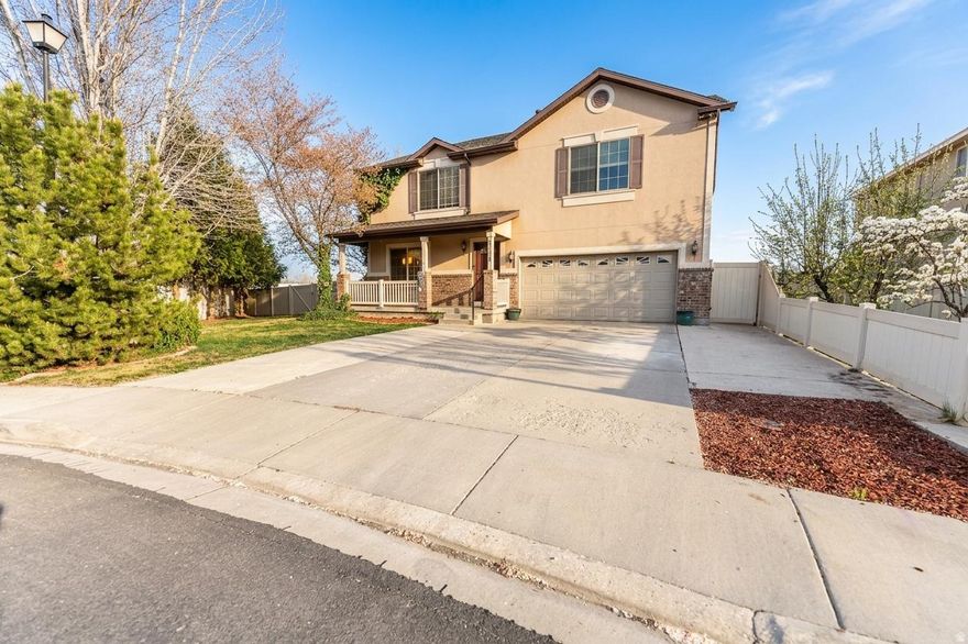 Discover the epitome of refined living in this stunning six-bedroom, three-bathroom residence located in the heart of Lehi, Utah. This home masterfully balances sophisticated charm with modern convenience, offering a turnkey experience.  The interior is highlighted with a fireplace and newer carpeting throughout, creating an atmosphere that is both elegant and inviting. The home's mechanical systems have been meticulously updated, featuring a brand-new roof/gutters, a newer water heater, and a high-efficiency dual AC and furnace system to ensure year-round comfort upstairs and on the main level.  Step outside to your own private sanctuary. The beautifully manicured yard is fully fenced and offers a rare sense of seclusion with no backyard neighbors. The centerpiece of the outdoor living space is the fully enclosed back patio, which features a premium hot tub included with the sale-perfect for relaxation in any season.  This residence is a rare find, combining premium upgrades with a tranquil setting. It is the perfect place to create lasting memories.    Square footage figures are provided as a courtesy estimate only and were obtained from an appraisal.  Buyer is advised to obtain an independent measurement.