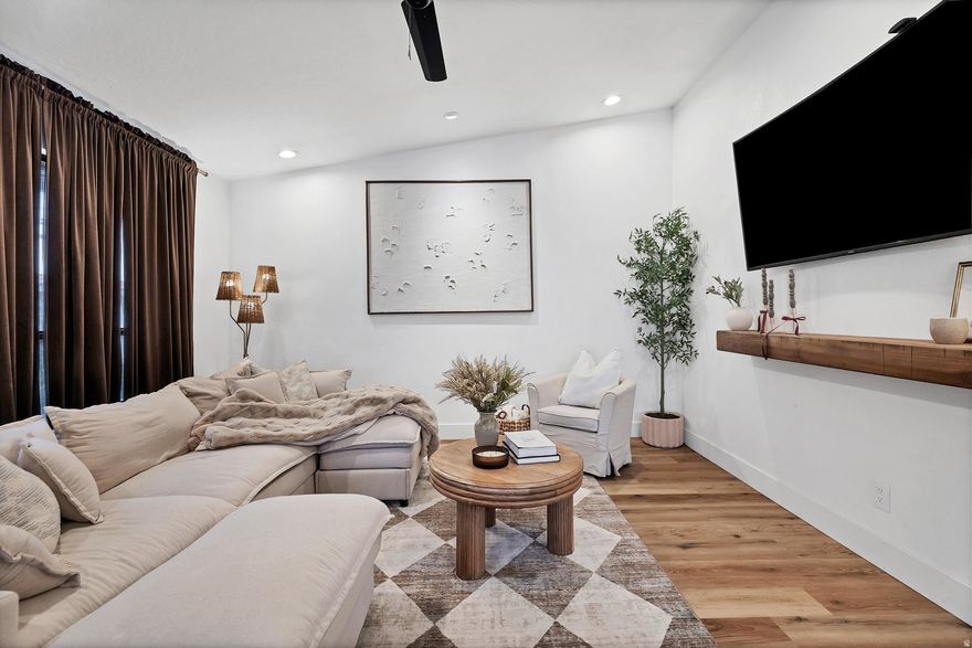 Welcome to the cutest updated townhome, featuring a freshly remodeled kitchen designed to feel more open, functional, and modern. The improved layout flows seamlessly into the living area, creating a bright and cheerful space perfect for daily living or hosting friends. One of the home's best surprises is the backyard-exceptionally large for a townhome and beautifully oriented to capture the stunning Red Mountain views. Whether you envision cozy evenings outside, a little garden, or a place for pets to play, this outdoor space delivers rare flexibility and charm. Small in size but big in personality, this lovingly updated home is truly adorable and ready for its next owner to enjoy.