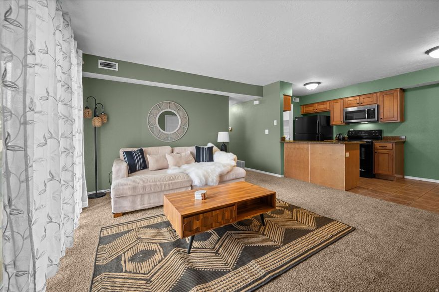 Enjoy easy, single-level living in this well-appointed condo in Bountiful. Designed for comfort and convenience, this home features a spacious primary suite, functional layout, and low-maintenance lifestyle. Ideally located just minutes from shopping, dining, and everyday amenities, with a quick commute to both Salt Lake City and Salt Lake City International Airport, this property offers the perfect balance of accessibility and tranquility. Tucked away from the main road, you'll appreciate the quiet setting while still being close to everything you need. Whether you're looking to simplify, invest, or enjoy main-level living, this condo checks all the boxes.