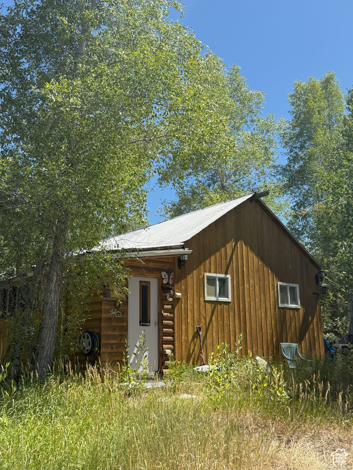 Amazing Opportunity for the FISHERMAN, RECREATION ENTHUSIAST, OUTDOORSMAN. There is an well with water right, natural gas, power and septic. Year Round ACCESS on a county road that is plowed all winter. The cabin is very rustic -built in 1957. The property is quite overgrown.