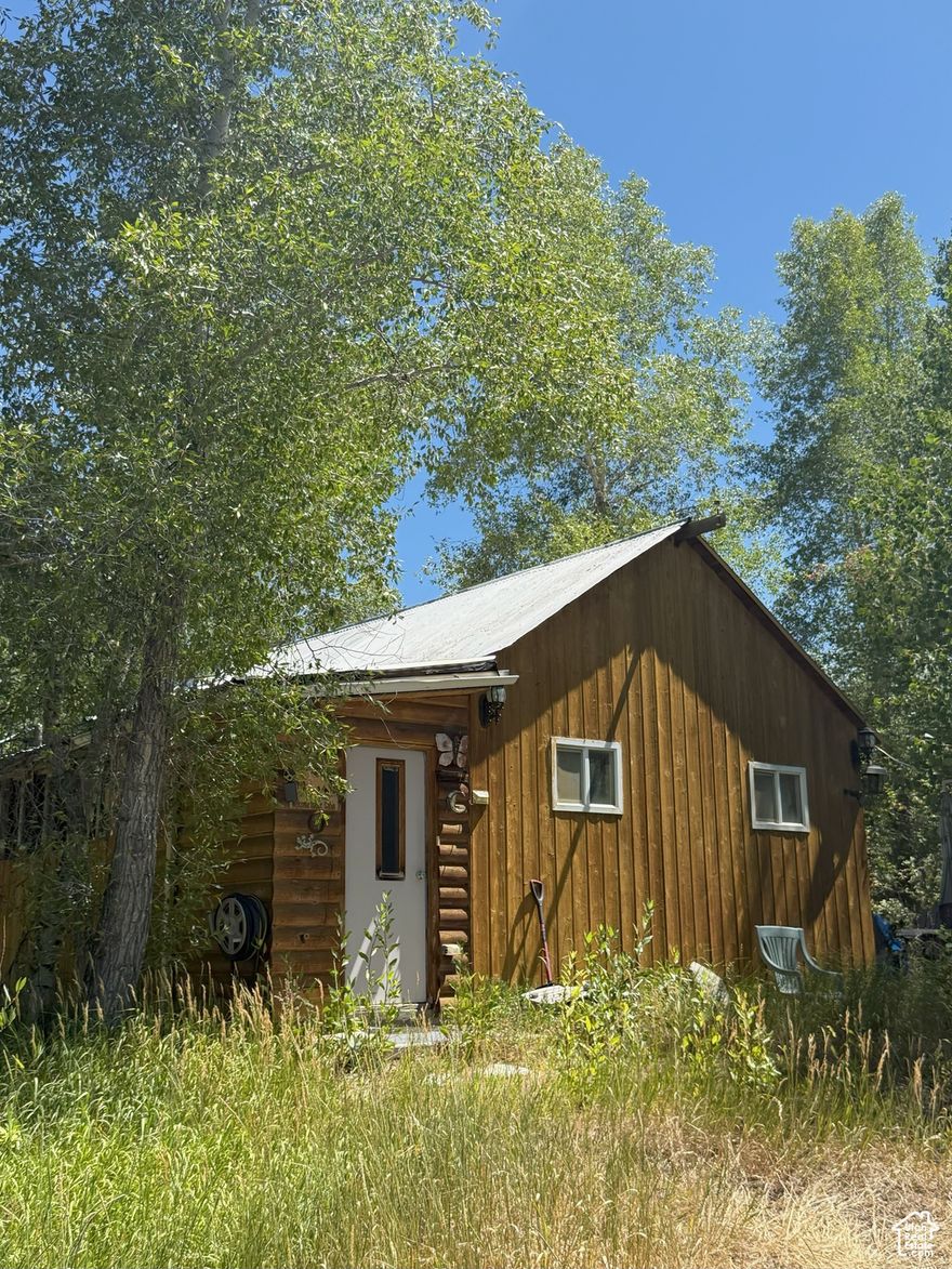 Amazing Opportunity for the FISHERMAN, RECREATION ENTHUSIAST, OUTDOORSMAN. There is an well with water right, natural gas, power and septic. Year Round ACCESS on a county road that is plowed all winter. The cabin is very rustic -built in 1957. The property is quite overgrown.