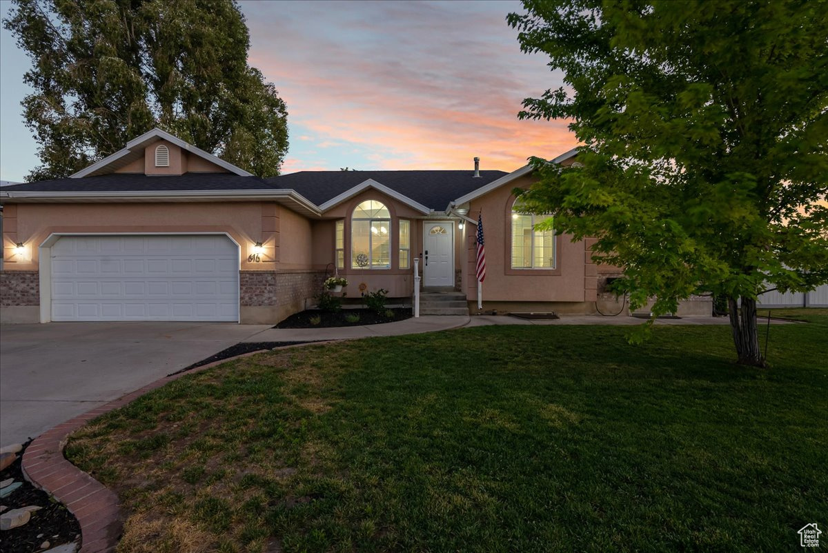 Dream rambler, nestled on a corner lot with stunning mountain vistas right outside your back door. This spacious 6-bed, 3.5-bath home is waiting for you. Imagine gatherings with loved ones in the open-concept living and dining area, perfect for making memories.  A generously sized master suite awaits, complete with a beautifully updated bath boasting dual vanities and a walk-in closet. A brand new finished basement, complete with a second kitchen, opens up possibilities with investment potential or multi-generational living.  All-new flooring, lighting, paint, a stylish bathroom, and updated HVAC and plumbing-all with permits pulled and city inspections complete.  The kitchen shines with newer stainless steel appliances and a handy corner pantry.  Step out onto the wooden deck and into your fully fenced backyard, featuring a convenient side RV pad.  Peace of mind comes with knowing the water heater, furnace, and water softener were replaced in 2018, and the roof in 2019.  Plus, you'll love being so close to parks for the kids to play, the serene Dry Creek for peaceful walks, the Payson Temple, and the convenience of Walmart and all the shopping you could need.