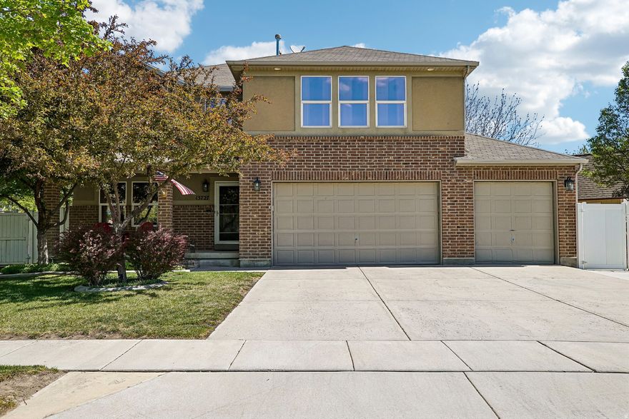 Do you fancy a home theater, a pool table, an amazing backyard with patio furniture and a gazebo included, and a secret hidden room behind a bookshelf? Yes? Then this is your dream home! This stunning two-story gem in Herriman explodes with space and personality on a massive .24 acre corner lot! So much space with 4131 sq ft. This 5-bedroom, 3.5-bath retreat features a huge master suite, oversized closets in every single room, elegant hardwood and tile flooring, and two cozy fireplaces. The finished basement is pure entertainment heaven, complete with included home theater equipment and an incredible secret room hidden behind the projector screen, accessed through a disguised bookshelf, perfect for extra storage, a kids playroom, or even a safe room! Upstairs, the loft transforms into an epic game room anchored by the included full-size pool table. Outside, the sprawling backyard shines with beautiful outdoor lighting for evening gatherings, while the dedicated shed workshop offers 220v hookups perfect for charging EVs plus a full electrical RV hookups, ready for all your toys and projects! The expansive 3-car garage completes the package in this vibrant, no-HOA community. Get ready to fall in love. This is where unforgettable moments begin!