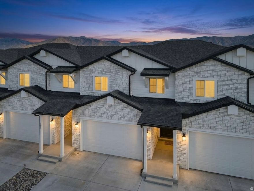 $5,000 IN CLOSING COSTS OR 1 YEAR RATE BUY DOWN WITH PREFERRED LENDER! Thoughtfully designed with both style and comfort in mind, this 4 bedroom, 2.5 bath home offers a bright, open floor plan perfect for modern living. The kitchen features white shaker cabinets and flows seamlessly into the living room, creating the ideal space for gathering and entertaining. Enjoy a blank canvas basement ready for your personal touch, whether you envision a home theater, gym, or extra family space. Once you step outside to the backyard you can relax and take in beautiful mountain views, the perfect backdrop for your morning coffee or evening unwind. Located just minutes from shopping, schools, and local amenities, with easy access to Salt Lake City in only 20 minutes, this home combines convenience, comfort, and community. Buyer/Agent to verify all.