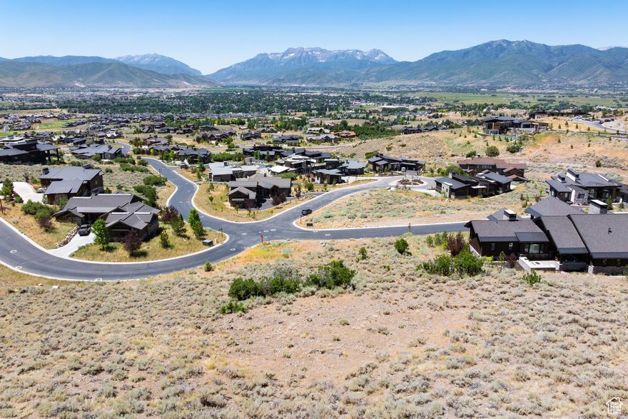 Discover an exceptional opportunity to own a 1.01-acre corner lot in the prestigious Red Ledges community of Heber City, Utah. This prime parcel is surrounded by HOA open space, offering enhanced privacy and a seamless connection to the natural beauty of the Wasatch Back.  Boasting expansive, unobstructed views of Mt. Timpanogos and the Wasatch Back, this lot provides the perfect canvas for your dream home in Red Ledges community. A full golf membership is available with separate deposit, granting access to Red Ledges world-class amenities, including the renowned Jack Nicklaus-designed golf course, equestrian facilities, tennis courts, and many other exclusive amenities.  Embrace the serene mountain lifestyle with year-round outdoor recreation and the charm of nearby Heber City, all while enjoying the privacy and prestige of this premier homesite.