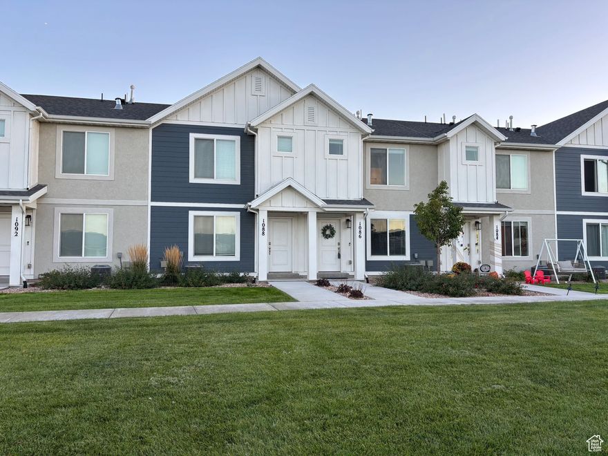 Dumont modern design gently and lovingly lived in with 3 spacious bedrooms, 2 full bathrooms, 2 car garage, 2 driveway parking spaces, guest parking adjacent South Bay Park with very close access to the Jordan River Trail. Ethernet wired family room and primary suite, quartz countertops, laminate wood flooring, stainless steel appliances, smart thermostat, MyQ smart garage door for deliveries! Almost 500 sq ft by 7 feet tall full cement crawl space, hello storage! Enjoy 2 outdoor swimming pools, multiple playgrounds, pickleball courts & basketball courts in the Northshore Community! Welcome Home!