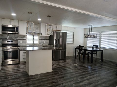 Tiny photo for 1209 W MEADOW STREAM RD #67, West Valley City, UT 84119 (MLS # 2133864)