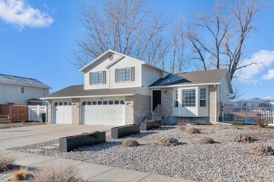 Exceptionally upgraded corner-lot residence with unobstructed eastern views of the Wasatch Mountains. The home features red oak hardwood floors and a fully reimagined kitchen (2023) with new cabinetry, countertops, and appliances. Major system enhancements include a 200-amp electrical service with all-new panel, breakers, whole-home surge protection, and a new AC condenser and compressor (2024). Enjoy rare privacy with only one neighboring home and no properties behind. The expansive, fully fenced backyard is anchored by mature shade trees and offers a private patio, hot tub, and a 192-sq-ft storage shed with mezzanine. Ideally located with quick access to I-15/I-215, downtown, the airport, and world-class mountain recreation.