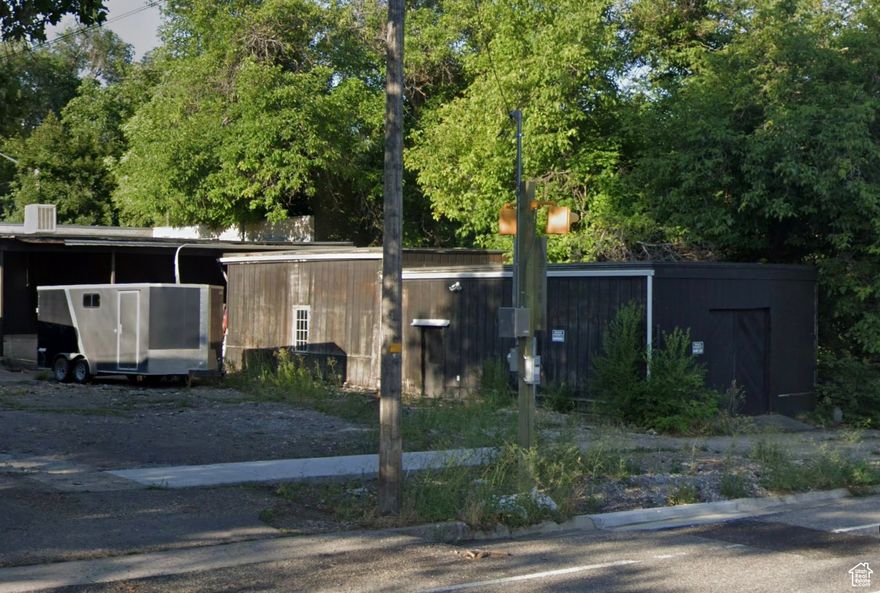 This is a historic old blacksmith shop.  A 1200 sq ft building (20' X 60')  Building that can be used commercially.  Seller has run water and power to the building.  Sewer is in the parking lot.  This is a build to suite commercial space.  You won't find a cheaper commercial building for the price.