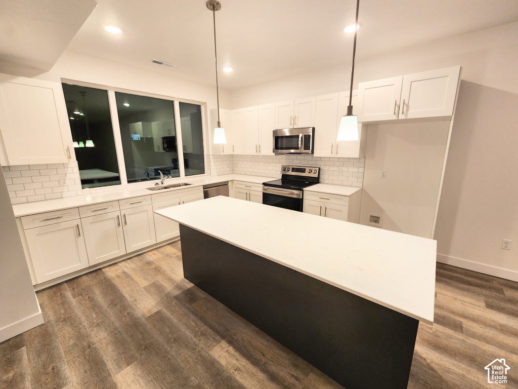 Photo of 5516 W VICTORY LAP CT S, West Valley City, UT 84120 (MLS # 2190841)