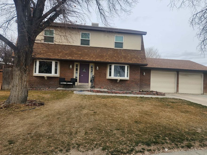 This beautiful 5-bedroom, 4-bath home offers plenty of space in a great location. With multiple living areas and a finished basement featuring its own kitchen, the layout provides flexibility for entertaining, guests or multi-generational living. This home has been meticulously maintained, making it truly move-in ready. Upstairs bedrooms are equipped with individual mini-split systems, allowing for personalized comfort and energy efficiency. Outside you'll find a large fully fenced backyard, patio area, RV parking, and an attached 2-car garage, offering plenty of space for both everyday living and gatherings. If you're looking for a move-in ready home with room to grow in a great location, this one is definitely worth seeing. Call today to schedule your personal tour.  Square footage figures are provided as a courtesy estimate only. Buyer is advised to obtain an independent measurement.