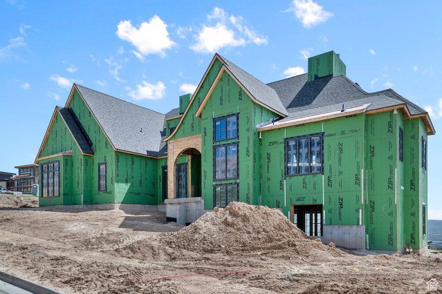 Beautifully designed Luxury Custom home in highly desired Vialetto neighborhood with incredible views of valley, mountains, and Lake. Brand new home will be fully finished and fully landscaped.  Expected to be finished by October 2025.  Conveniently located minutes from hiking and biking trails, restaurants, shopping, parks, schools, and quick access to I-15. Complete with Gorgeous floor to ceiling windows, 50" gas/wood burning open main fireplace, primary suite on main floor, 48" range with a 75" refrigerator, Two 15' bifold slider doors that open all the way to deck and basement patio large vaulted ceilings, huge open concept plan, walk in Butler pantry, huge laundry room with double washer and dryer, venetian plaster custom curbless showers,  custom built cabinets and built-ins, hardwood flooring though out, RV  parking, home office space, theater room, 3 fireplaces though out home, aluminum windows, gas copper lantern, full walk out basement with 10 ft ceilings, and oversized 1,251 sq ft garage, and so much more. Incredible workmanship and detail in every part of this home. Pictures will be updated. Call Agent for more information.