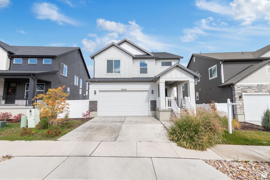 MOTIVATED SELLER! Clean, bright, and beautifully simple, this Herriman two-story offers the rare combination of an established neighborhood with newer surrounding development-plus no backyard neighbors and unobstructed views you won't find in most west-side homes. With a clear shot of the Kennecott Copper Mine and open space behind the property, the privacy and scenery here are truly standout features.  Inside, over 2,800 sq ft of thoughtfully designed space includes an open layout, soaring ceilings, and large windows that fill the home with natural light. The kitchen features quartz countertops, an oversized island, and timeless cabinetry, along with a spacious dining area perfect for everyday living or hosting. Upstairs, the generous primary suite includes a walk-in closet and double-sink bath, with two additional bedrooms and a full bathroom just down the hall.  Step outside to a raised deck overlooking permanent open space-ideal for quiet mornings, sunset views, or effortless entertaining. The fully fenced yard, two-car garage, and unfinished basement with room to grow make this home as functional as it is inviting. With move-in-ready comfort, priceless views, and no future development behind you, this is the kind of property buyers wait for in Herriman.