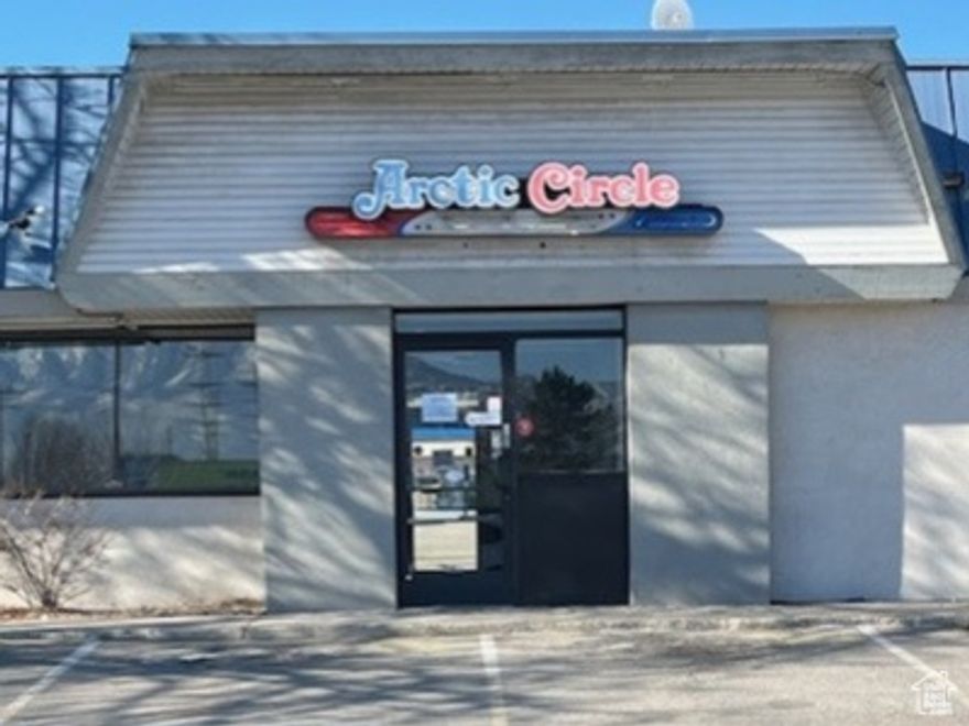 One of the busiest intersections in the Salt Lake Valley. Take advantage of this rare opportunity to get into a fast food restaurant building with drive thru, hood system, grease collector, refrigeration, freezer, tables & chairs still in place.  Landlord will install a grease trap if required by the city.  Square footage figures are provided as a courtesy estimate only and were obtained from SL County.  Tenant is advised to obtain an independent measurement.