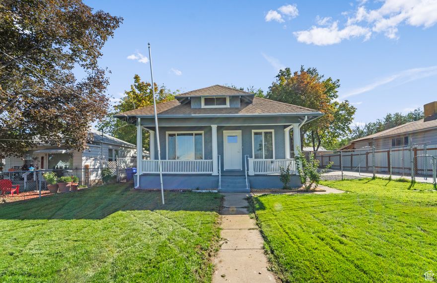 READ REMARKS CAREFULLY! Move-in ready! Two renovated homes on one lot.  The main home offers 2 bed/1.75 bath upstairs + finished basement office, 1/2 bath & laundry. 1096 sqft. The separate, backyard ADU offers: 2 bed/1 bath w/full kitchen, living & laundry 800 sqft. The ADU is perfect for rental income, multigenerational living or a private guest space. Both homes are newly renovated with new flooring, paint, windows, cabinetry, countertops, appliances & central air/heat. Fully fenced yard with automatic sprinklers in the front yard, mature trees, and 5 car driveway. Located within walking distance to Tooele High School & Pratt Aquatic Swimming Pool. Enjoy beautiful Stansbury Mountain views from your front porch. All renovations completed with city permits & inspections. Total square footage for both homes is 1896 square feet.  This property combines a complete remodel, modern upgrades, and excellent investment potential. Don't miss your chance to make it yours!