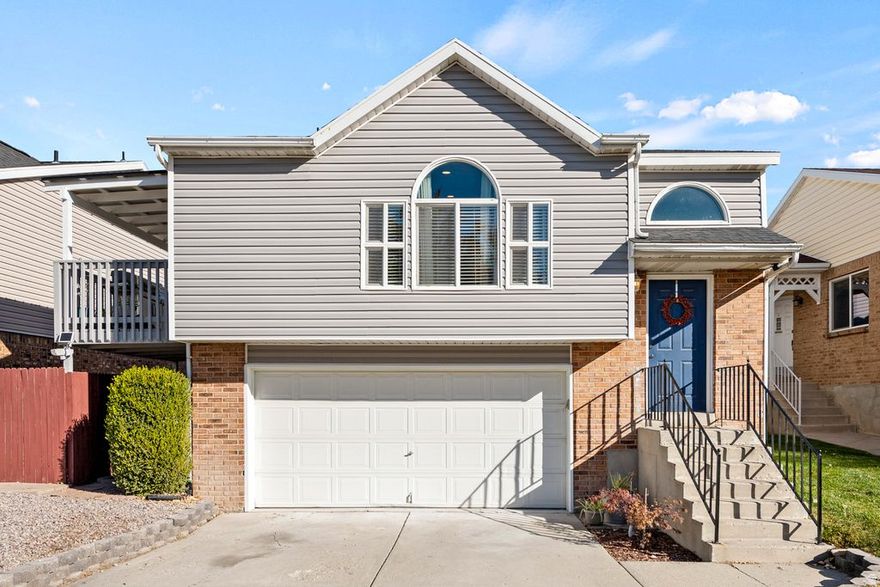 Cute, Cozy, and Move-In Ready!  This sparkling home combines comfort and charm with a spacious main-floor living room that opens to a beautifully updated kitchen. Enjoy indoor-outdoor living with a covered deck that extends your entertaining space and overlooks the private, fully fenced backyard-perfect for gatherings or quiet evenings. Three bedrooms on the main level offer versatile space for family, guests, or a home office. The lower level features a private bedroom,   bath, and a family room with a walkout to the backyard, making it ideal for multi-generational living or a private guest suite.  Conveniently located near parks, schools, and shopping, this home is ready for you to move right in and enjoy!