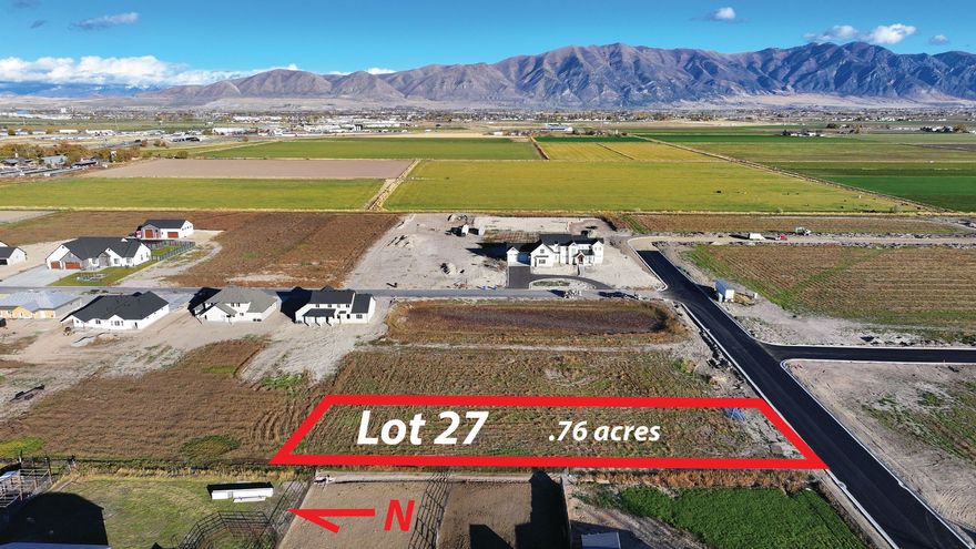 Build your dream home on this .76-acre flat lot located among large country parcels with animal rights. Enjoy beautiful Wasatch Mountain views and wide-open surroundings, perfect for those seeking a rural lifestyle with room to grow. The level terrain offers easy building potential and flexible design options. This property includes a West Corinne Culinary Water Share, adding value and convenience. Natural gas and electric are available at the lot line, and fire hydrant coverage is in place for added safety and peace of mind. Whether you're looking to build now or invest for the future, this lot provides the ideal balance of country living and accessibility. With generous space, scenic views, and essential utilities nearby, this is a rare opportunity to own a versatile homesite in a desirable country setting.