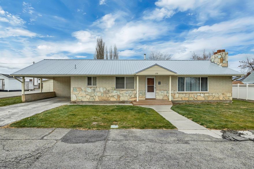 Opportunity awaits with this older home in Payson situated on a .39-acre lot, offering exceptional flexibility and upside. The property features new carpet, fresh interior paint, and a new roof, providing a great starting point for an owner, investor, or developer. The expansive lot allows ample room for a potential shop or additional improvements, and the property is eligible for commercial zoning. There is also potential for multi-housing development, including the possibility of a fourplex or larger project, subject to zoning, town approval, and due diligence. This property presents a rare chance to own a sizeable parcel with multiple potential uses in a growing area. Buyer and buyer's agent to verify all information, zoning, development potential, and intended use.