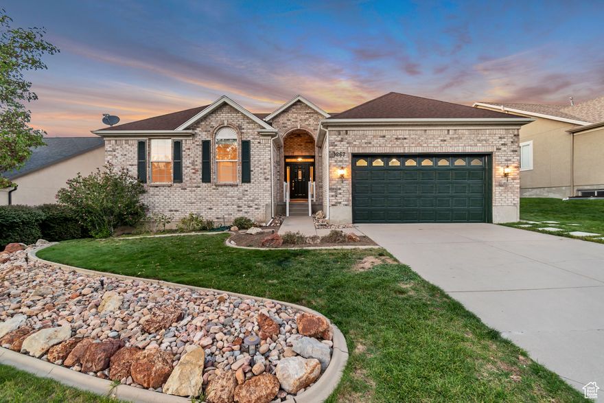Perched On One Of The Few Lots With Unmatched Panoramic Views Of The Entire Salt Lake Valley & Wasatch Mountains.  Watch the Sun Rise behind the Mountain and the Sun Set on The Horizon Showcasing the Splendor of The Salt Lake Valley - It's Absolutely Spectacular! This Home Has The Wow Factor The Moment You Walk-In! | Loaded w/Custom Features & Upgrades | Recently Updated w/ New Carpet, New Stylish Luxury Vinyl Flooring, New Paint, New Appliances, & New Lighting | Huge Kitchen With Loads Of Cabinets & Stainless Steel Appliances | Spacious & Bright Family Room | Soaring Vaulted Ceilings | Custom Built-In Surround Sound System & Speakers on Main Floor Included | Plantation Shutters | Formal Living Room | Formal Dining Room (Could Be Office/Den) | Primary Bedroom w/Huge Walk-In Closet and Bright Ensuite Bathroom w/Separate Tub & Shower | 3 Generous Size Secondary Bedrooms | Dual Fireplace w/Carrera Marble Tile | Built-In Shelf Space | Recessed Lighting | Expansive Basement | Pre-Plumbed For 2nd Kitchen & 2nd Laundry Room | Incredible Theater Room w/ Surround Sound & Speakers | Huge Second Primary Bedroom With Extra Large Spa-Like Bathroom Ready For Customized Finishes - Perfect For Mother-In-Law Quarters | Beautifully Landscaped Yard w/ Mature Trees & Shrubs | Large Deck Across The Back w/ Incredible Views & Feeling Of Privacy | Room For Rv Parking | Easy Access To Freeways, Schools, Shopping, Restaurants, Parks, Golf Courses.