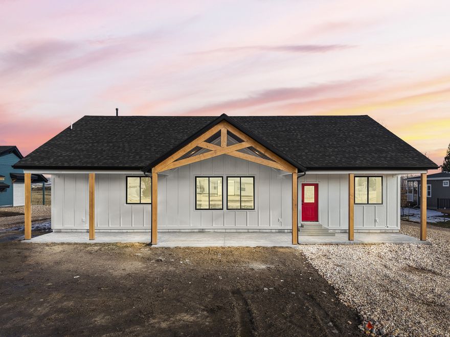 Step into effortless living with this thoughtfully designed 1,920 sq. ft. home featuring 4 spacious bedrooms, 2 modern bathrooms, an oversized great room and open kitchen filled with ample lighting. Beautifully crafted by Evolve Home Builders, this quality new build features premium construction materials. It is built for comfort and convenience, this low-maintenance home with advanced features like conditioned air space, upgraded insulation throughout, and the innovative Zip System sheathing that ensures long- lasting durability and energy efficiency. Stay connected and in control with smart home technology, including smart lighting and a smart thermostat, giving you ultimate convenience at your fingertips. Every detail has been carefully considered to create a home that is fully sealed from attic to crawl space, keeping you comfortable in every season while lowering energy costs. A detached two-car garage will soon complete the property, adding even more functionality and value to this exceptional home. Designed for easy living with minimal upkeep, this home is the perfect blend of modern technology, superior construction, everyday comfort and small town living. Located just two blocks from the school and only 15 minutes to Bear Lake or forest trails up Paris Canyon.