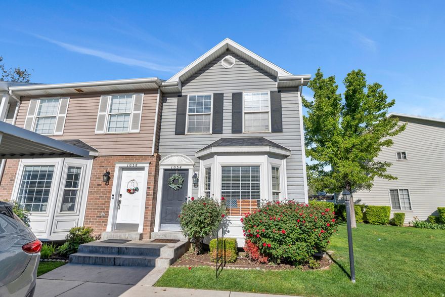 Beautiful mountain views and a prime location make this charming row-end unit a must-see! This 2-bedroom, 2-bath home features a fenced backyard perfect for relaxing, entertaining, or family gatherings. Enjoy the added privacy of an end unit along with access to fun community amenities including parks and playgrounds that are perfect for families and outdoor enjoyment. Comfortable living, scenic surroundings, and a welcoming neighborhood all come together in this wonderful home. Square footage taken from the SL county Records Buyers to verify all.