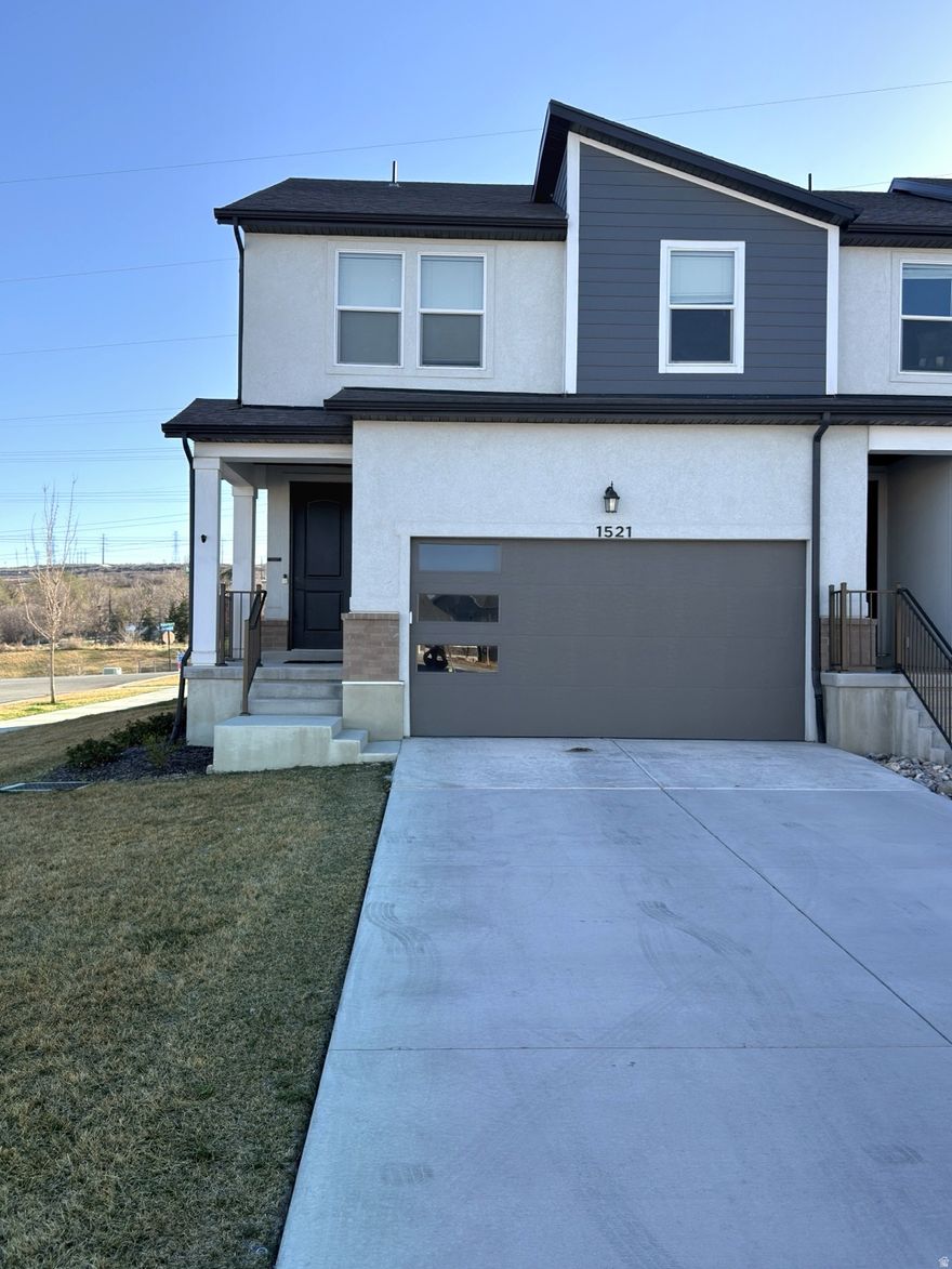 Welcome to this stunning three-bedroom, three-and-a-half-bathroom townhome, perfectly situated on a desirable corner lot. With over $65,000 in exquisite upgrades, this home boasts a blend of elegance and modern convenience that is sure to impress.  Step inside to discover a beautifully designed interior featuring a custom fireplace, and Luxury LVP Flooring throughout the main floor. The home is equipped with electronic shutters and smart home switches in almost every room, providing both comfort and efficiency at your fingertips.  One of the standout features of this property is the finished basement, complete with a spacious family room that's ideal for entertaining friends and family. Whether you're hosting a movie night or a casual get-together, this space is versatile and welcoming.  Don't miss the opportunity to make this exceptional home yours! Schedule a viewing today and experience all the luxurious details yourself.