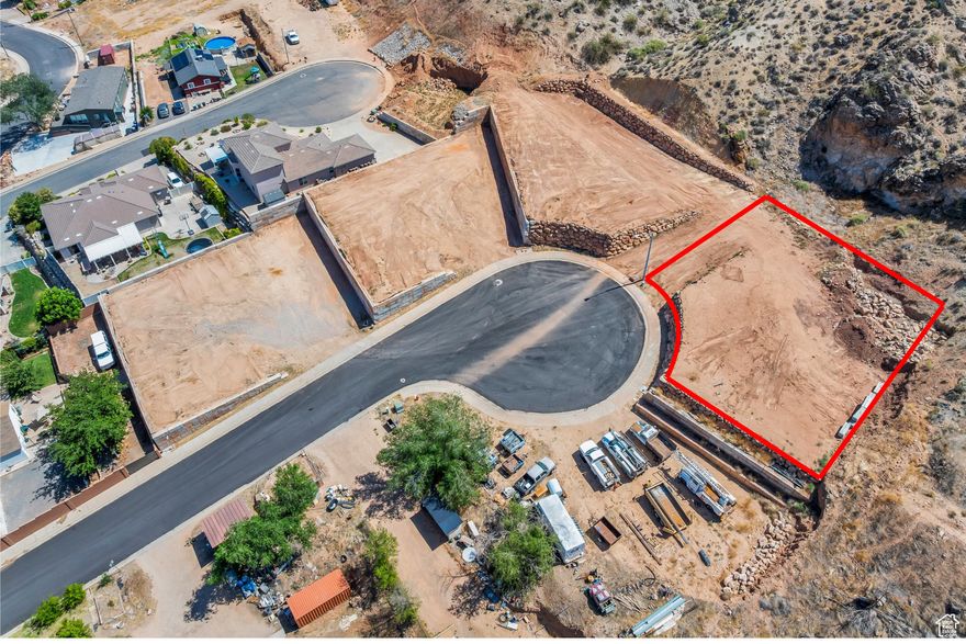 This 0.24-acre lot is part of four contiguous parcels, offering endless potential. It's the perfect place to build your dream home, surrounded by peaceful desert landscapes and breathtaking views. You also have the option to add an accessory dwelling unit (ADU) for additional living space or rental income. For builders and developers, these lots offer excellent investment potential and back up to an incredible ridgeline that enhances privacy and scenic value. With no HOA and the ability to bring your own builder, the possibilities are wide open. Located near Zion National Park, Sand Hollow, Warner Valley, sand dunes, and world-class outdoor recreation, this is a rare opportunity to create something truly special. Buyer/buyer agent is responsible for verifying all information.