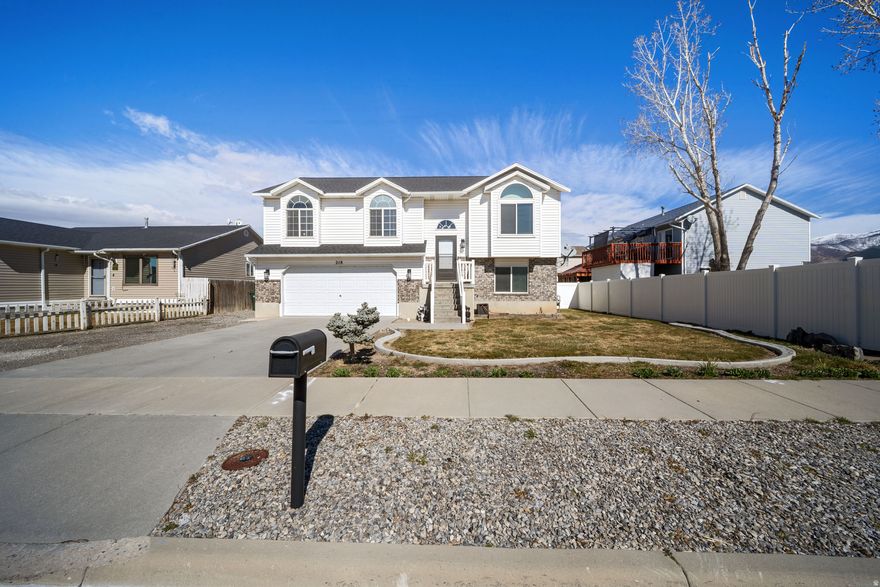 Well-maintained and nicely updated single-family home in a desirable Tooele neighborhood with great views. Seller has completed numerous recent upgrades including a new roof, new AC condenser, new smoke detectors, and a 7-stage reverse osmosis system connected to both the kitchen sink and refrigerator. Both the interior and exterior electrical panels have had breakers replaced and surge protectors installed. Sprinkler system has a new back flow valve. Kitchen updates include new faucet and new dishwasher. Yard has been refreshed with new pea gravel and bark landscaping. Home shows pride of ownership and has been carefully maintained. Easy to show.