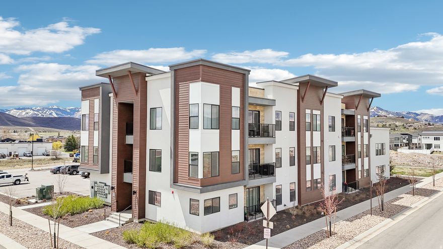 Welcome to easy mountain living in the heart of Silver Creek Village - one of Park City's newest and most rapidly growing communities. Built in 2022, this thoughtfully designed top floor studio unit offers a bright, open layout with contemporary finishes, stainless steel appliances, and an in-unit washer and dryer for everyday convenience. Ample windows invite in natural light and showcase the mountain views. This unit includes a spacious 10' x 5' storage unit on the main level- ideal for storing all your outdoor gear, whether you're heading to nearby hiking and biking trails, skiing at Park City or Deer Valley Resorts (just 10 minutes away), or exploring the countless recreation opportunities in the Wasatch Back. The community is designed for walkability and will soon feature retail shops, restaurants, a grocery store, parks, an amphitheater, and more. With easy access to the free High Valley Transit system just steps away, commuting to Salt Lake City or around Park City has never been easier. With the ability to rent nightly, this unit offers incredible flexibility whether you're looking for a full-time residence, vacation getaway, or investment property. Convenient access to Salt Lake, Kamas, or Heber Valley.  Vibrant new Park City neighborhood!