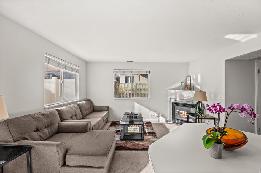 RARE END-UNIT TOWNHOME in a quiet, well-kept community! This home features a smart layout with 3 bedrooms and 2.5 baths, including a spacious primary suite with its own bathroom. The main level feels open and comfortable with a gas fireplace and convenient half bath, plus a fully fenced private patio for easy outdoor living. This home has been meticulously maintained by the owner, and has recently received a fresh coat of paint, new water heater, and water pressure regulator.   The community offers great amenities, a central location close to shopping and parks, and excellent freeway access for quick commuting. Clean, well cared-for, and move-in ready - a solid find in a tight market.