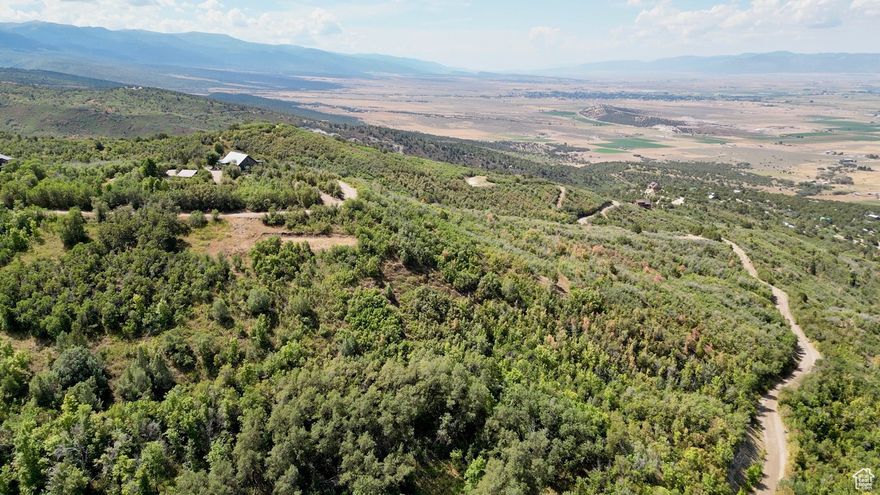Ready to build? This 1.82-acre lot in Legacy Mountain comes with a cabin pad already cut in, saving you time and money. With good usable space and a gentle slope, it's the perfect launchpad for your dream mountain getaway.  Located in a gated community just outside Fairview, this property offers the best of mountain living-quiet privacy, year-round recreation, and sweeping views of the surrounding peaks and valleys. Power and water are available at the road, making the build process smooth and straightforward.  Whether you're relaxing under the aspens, watching wildlife pass through your trees, or heading out for a weekend of snowmobiling, hiking, or 4-wheeling, Lot 4 offers a rare blend of convenience, beauty, and adventure. This is more than a lot-it's your place to connect with nature and create something lasting.