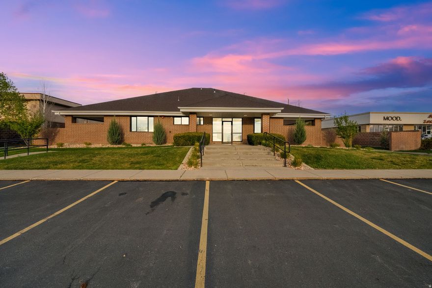 Premier Fully Remodeled Office Headquarters with a Warm, Home-Like Feel. This well-appointed office building in a prime Sandy, Utah location, offering outstanding visibility and convenient freeway access. This approximately 10,000 square foot property is situated on a full 1-acre lot and presents a rare blend of private offices, collaborative workspace, and executive-level amenities. The interior has been thoughtfully upgraded throughout, featuring new windows, flooring, electrical, plumbing, HVAC systems, roof, bathrooms, lighting, cabinetry, a modern key-card security system and landscaping. The flexible layout includes many options for the spaces, conference rooms, and two expansive bullpen areas-ideal for growing teams or dynamic business operations. Enhanced soundproofing throughout the building creates a quiet, focused environment with increased privacy, making it especially well-suited for professional and client-facing businesses. Designed to support both productivity and workplace culture, the building offers a full kitchen, two additional kitchenettes, multiple lounge areas, and a dedicated game space. Four executive offices are further enhanced with private decks, delivering a distinctive and elevated professional environment. The layout and amenities lend themselves to a wide range of professional uses, including medical or wellness practices, counseling, therapy, psychology, social work, and other service-based businesses. The property's prime location places it within a vibrant corridor of dining, shopping, and hotel amenities, providing convenience for both employees and clients, as well as opportunities for meetings and after-hours engagement. The exterior provides ample parking, new landscaping, and a grass area, creating strong curb appeal and a welcoming setting. This is an excellent opportunity for an owner-user or investor seeking a versatile, turnkey office property in a highly desirable and accessible location. Schedule today to tour the building.