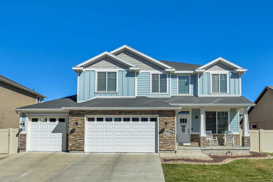 ***Open House this Saturday, March 21st, 11am - 2pm*** This beautiful two story home in South Jordan boasts an attached ADU with a separate walkout entrance that can be rented out to offset the mortgage! Talk about smart home buying! This home also features a comfortable and functional floorplan with big open spaces that flow perfectly! The open concept kitchen/family room area is the perfect main gathering spot in the home! A generous amount of windows provides ample natural light throughout the day. The Kitchen is warm and inviting with beautiful granite countertops, gorgeous white cabinets, tile flooring and stainless steel appliances! The spacious primary bedroom features an ensuite bathroom and an enormous walk-in closet! Upstairs you'll find 5 bedrooms and 2 full bathrooms.  Downstairs you'll find plenty of storage space and a 1 bedroom apartment (ADU) with it's own private entrance. The ADU has a separate HVAC unit so they can control their own temperature. The 4 car garage (3rd car tandem) has a separate garage door on the back of the home for easy access to the yard and patio area. The fully fenced and landscaped backyard features a large concrete patio with a pergola, a nice grass area and a shed. Easy access to Bangerter Hwy and just minutes away from schools, parks and The District for all of your shopping, dining and entertainment. Did we say NO HOA??? This is an absolutely lovely home in a wonderful neighborhood! Put this home on your must see list!
