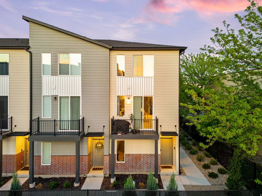 Own the best views at Dawson Place and a new-construction lifestyle with little to no maintenance, just minutes from the party in Downtown. This perfectly positioned, furnished, semi-custom, end-row condo-style townhome is only two years old and offers a shockingly low HOA fee of $180/month, with electricity as the only utility paid separately. Yes, really. Internet, insurance, landscaping, snow removal, water, trash, and more are included. Dawson Place is all-electric, sustainable, and easier on both the environment and your wallet. Each bedroom features an attached ensuite bath, while the tandem garage is large enough for a truck, another car, and storage. Offering more scenery and privacy than most, along with the peace of mind that comes with newer construction and long-term appreciation potential. Ever-changing Oquirrh Mountain views, unforgettable sunsets and sunrises, a coveted corner lot, and included furnishings and appliances make this property especially rare. Live here for a year, rent it afterward, and lock in an investment near Utah's projected $6.6B 2034 Winter Olympics, the $3.5B Power District underway, and the $27M Glendale Regional Park. Questions or showing requests? Contact listing agent Sydney Rosenblatt.