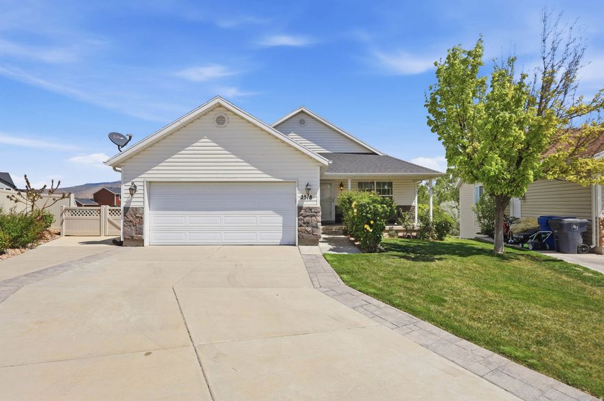 Open House this Saturday, April 25, from 11:00 AM to 1:00 PM. This sought-after Harvest Hills home is located in a quiet cul-de-sac and is ideal for multi-generational living. The property features a welcoming front porch and a walk-out basement with a full mother-in-law apartment. Throughout the home, you will find vaulted ceilings, spacious family rooms, and well-sized bedrooms. The kitchen includes recessed lighting, a bay window, and stunning valley and mountain views. The basement offers oversized bedrooms and an open-concept kitchen and living area that leads to an outdoor patio. A large laundry area is conveniently situated to be shared between both levels. Outside, the fully landscaped and fenced yard includes a dog kennel, a pear tree, also with  impressive valley and mountain views. The Harvest Hills community provides access to numerous parks, trails, pickleball courts, playgrounds, and a community garden. Located in the heart of Saratoga Springs, the home is minutes away from shopping, dining, and entertainment, with quick access to 2100 N, I-15, Mountain View Corridor, Bangerter Highway, Pioneer Crossing, Primary Children's Hospital, Camp Williams. Square footage figures are provided as a courtesy estimate only and were obtained from county records. Buyers are advised to obtain an independent measurement.