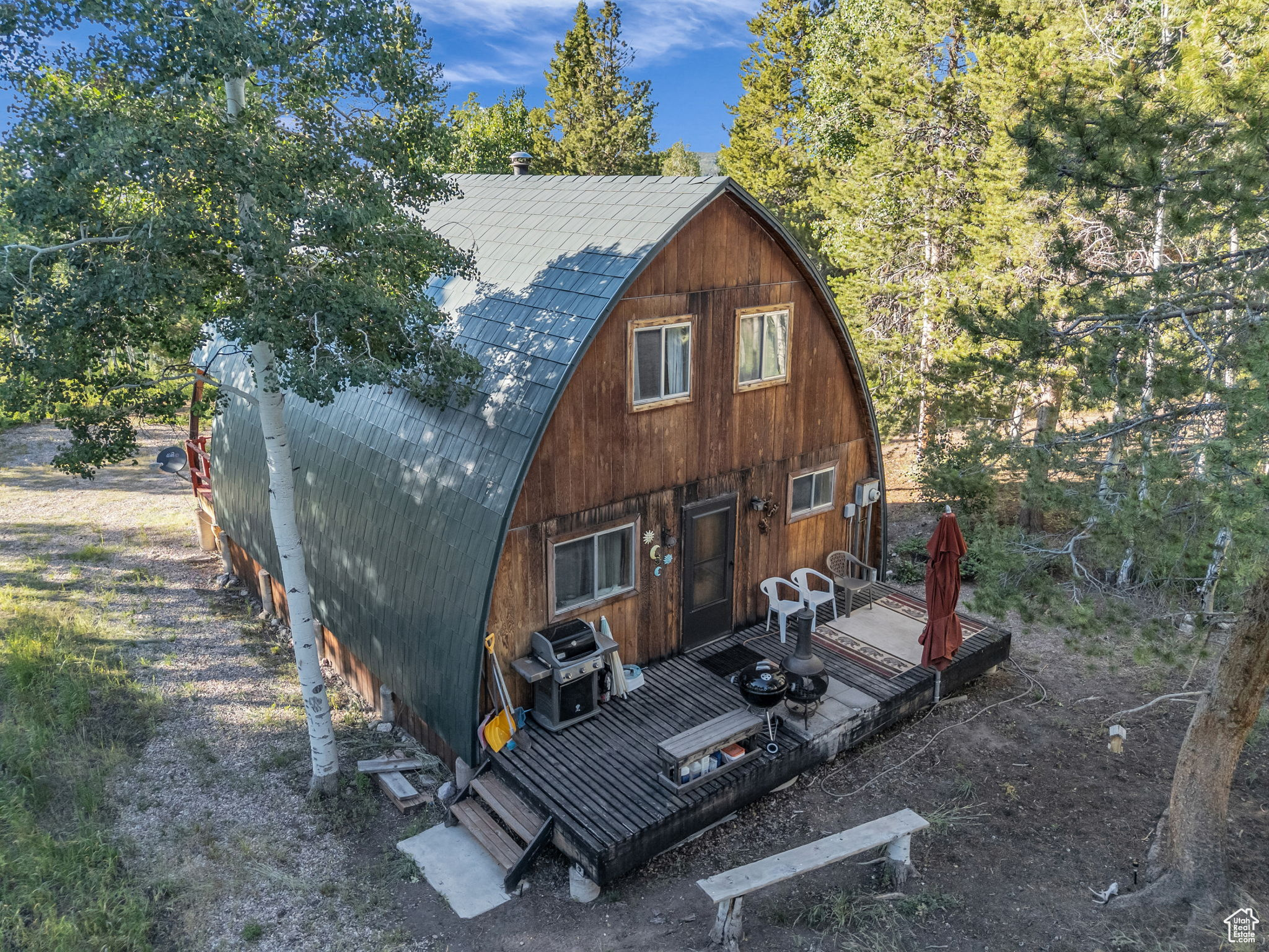 Tucked away in the heart of the stunning Uinta Mountains, this secluded cabin offers the perfect escape from the hustle and bustle of everyday life. Surrounded by towering aspens and whispering pines in the highly sought-after Uintalands Subdivision, this cozy mountain retreat features 2 bedrooms, a charming sleeping loft, and 1 full bathroom-perfect for family getaways, romantic weekends, or unforgettable adventures with friends. Set on 3.43 acres of peaceful, private land, there's plenty of room to stretch out, explore, and even invite others to camp under the stars on your own slice of mountain paradise. Picture yourself sipping coffee on the porch while deer and moose wander through the trees, or heading out on a snowmobile or RZR ride straight from your cabin into thousands of acres of pristine wilderness. Whether it's a peaceful morning hike or an adrenaline-filled afternoon exploring the backcountry, this property puts you right in the heart of it all. An F-150 with snow tracks is also available for separate purchase, making winter access a breeze via the groomed roads, while the main road is plowed year-round to the community parking lot. Whether you're seeking solitude or looking to host unforgettable mountain adventures, this one-of-a-kind retreat has it all.