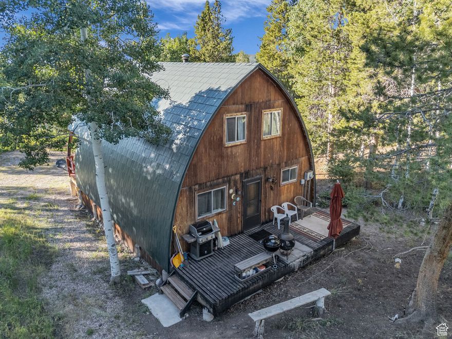 Tucked away in the heart of the stunning Uinta Mountains, this secluded cabin offers the perfect escape from the hustle and bustle of everyday life. Surrounded by towering aspens and whispering pines in the highly sought-after Uintalands Subdivision, this cozy mountain retreat features 2 bedrooms, a charming sleeping loft, and 1 full bathroom-perfect for family getaways, romantic weekends, or unforgettable adventures with friends. Set on 3.43 acres of peaceful, private land, there's plenty of room to stretch out, explore, and even invite others to camp under the stars on your own slice of mountain paradise. Picture yourself sipping coffee on the porch while deer and moose wander through the trees, or heading out on a snowmobile or RZR ride straight from your cabin into thousands of acres of pristine wilderness. Whether it's a peaceful morning hike or an adrenaline-filled afternoon exploring the backcountry, this property puts you right in the heart of it all. An F-150 with snow tracks is also available for separate purchase, making winter access a breeze via the groomed roads, while the main road is plowed year-round to the community parking lot. Whether you're seeking solitude or looking to host unforgettable mountain adventures, this one-of-a-kind retreat has it all.