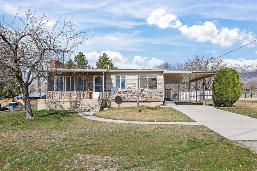 This home is ready for you to make it your own.  The upstairs needs some updating and the basement is unfinished so you can envision your own dream.  The furnace was replaced in 2024 and the AC in about 2016.  Laundry is located on the main level and there's a ramp in the carport if your looking for easy entry.  Peach tree produces like crazy.  Enjoy easy interstate access only about a mile west of the house.  Crystal Springs is also close if you'd like to soak in the mineral water.