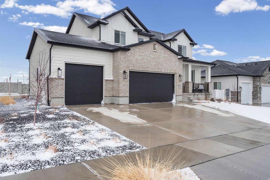 Photo of 6852 W WINDY OAK DR #128, Herriman, UT 84096 (MLS # 2138589)