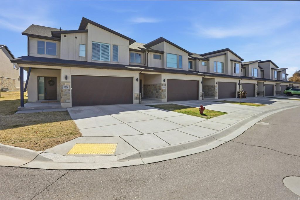 Photo of 1890 S COURTNEY WAY W #7, West Haven, UT 84401 (MLS # 2143495)