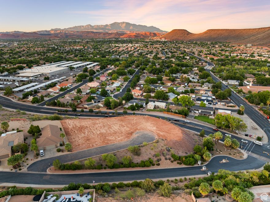 Bring your own builder to this engineered and pad ready, gorgeous .33-acre lot. Nestled in a quiet cul de sac, in the Crown Point gated community, you'll enjoy forever unobstructed panoramas of Pine Valley, Snow Canyon, and Red Mountain. This is the kind of scenery people travel for, right outside your back door. This homesite combines privacy with unbeatable views. Pad-ready, with a full soils engineer report, you'll enjoy a head start on the build process. You can design a home that frames those views exactly the way you want. Adjacent lots are available to make almost one acre of buildable land! Inquiry for special pricing for purchasing all three. HOA fee includes water for the home and landscaping.