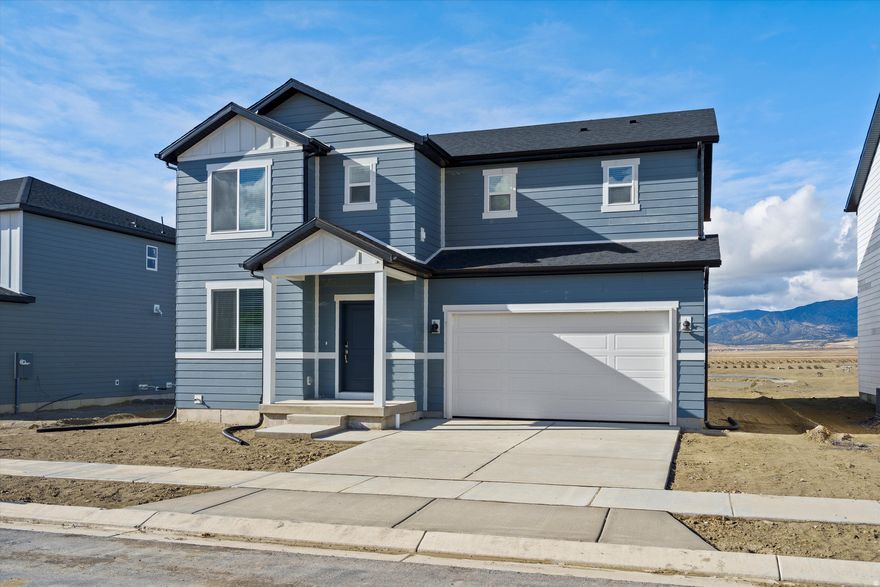 This home's cohesive great room, dining room, and kitchen make entertaining easy. Upstairs, unwind in the primary suite with a spacious bathroom and walk in closet. Move in ready with a washer, dryer, fridge and blinds throughout!  Unfinished basement included. Total home approx. sq. ft. 3,411.