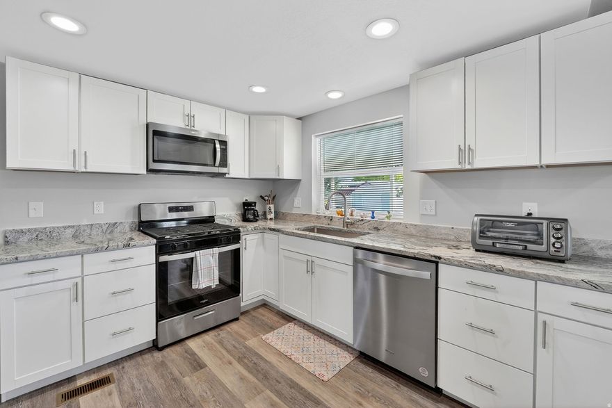 Beautifully updated 3-bedroom, 2-bath home in the desirable 55+ Monte Vista community. From the moment you walk in, you'll feel the warmth and comfort this bright, inviting home offers. The fully remodeled kitchen features granite countertops, stainless steel appliances, and a gas range-perfect for everyday living and gathering with loved ones.  The updated bathrooms include a walk-in shower, and the home offers a generously sized storage closet for added convenience. Recent improvements such as new skirting and a new roof provide peace of mind for years to come.  Step outside and you'll find a large storage shed, giving you plenty of extra space for hobbies, tools, or seasonal items. The community itself is clean, welcoming, and known for its friendly neighbors-making it easy to feel right at home.  Ideally located near shopping, dining, and freeway access, this home offers both comfort and convenience. Come see why so many love living here-this could be the perfect place to call home.