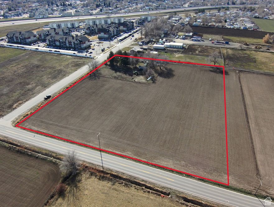 Prime piece of light industrial  property with frontage on 2 side's. Close proximity to I-15 Interchange.  Property is annexed into Payson City.  Property is zoned light Industrial. Immediate cash flow with a residential home. 1540 sq. ft. remodeled home is on the property for income.