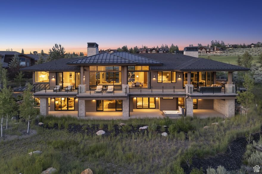 Luxury Promontory Estate - Introducing a truly extraordinary contemporary estate in the coveted Promontory Club of Park City, completed in 2023 with the utmost attention to luxury, comfort, and timeless design. This masterpiece blends architectural sophistication with the natural beauty of the Wasatch Mountain Range, offering forever views that elevate every living experience. This custom-built residence features radiant in-floor heating throughout the entire home, driveway and garage ensuring year-round comfort. The thoughtfully designed floor plan offers a private upstairs primary suite and a dedicated office, adjoined by comfortable living spaces and exterior heated patio and dog run; while the lower level includes four additional bedrooms and a fully equipped home gym, ideal for hosting guests or family retreats. Crafted with an eye for exceptional detail, the home showcases top-tier materials and finishes, including Calcutta marble, porcelain tile, and extensive use of rich natural materials and designer wall coverings. High-end Graff hardware, TOTO washlets, and luxurious steam showers complement the spa-inspired bathrooms. Technology and design go hand-in-hand here, with a full Crestron smart home system, Lutron lighting and automated shades, and lighting fixtures by Kelly Wearstler and Arteriors, a central vacuum system that extends to the garage for all of your toys and an oversized dog wash. Wall coverings by Phillip Jeffries add texture and depth, enhancing the overall ambiance. Whether entertaining or enjoying quiet moments, the living spaces seamlessly connect indoor and outdoor luxury. This home is a statement of elevated mountain living-modern, warm, and flawlessly curated by a seasoned design team. A Full Golf Membership to Promontory Club is available outside of the home purchase with no transfer fee, offering access to world-class amenities, private golf, fine dining, equestrian facilities, and more.
