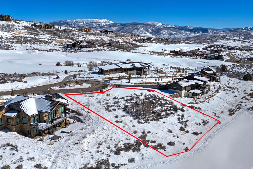 This beautiful lot is located on the 16th fairway of the championship Mark O'Meara-designed golf course in the highly sought-after Tuhaye Development, offering panoramic golf and mountain views in one of Utah's most prestigious private communities. What an ideal opportunity for stunning sunsets and the overall natural beauty of the Wasatch and Uinta Range, as well as an ideal building envelope for your custom mountain retreat. Enjoy privacy, open space, and direct fairway access in a serene setting just minutes from the new Deer Valley East Village and Park City. Ownership includes the opportunity for a membership to Talisker Club, offering world-class amenities including golf, spa, fitness, dining, pool, and exclusive on-mountain access at the Tower in Deer Valley.