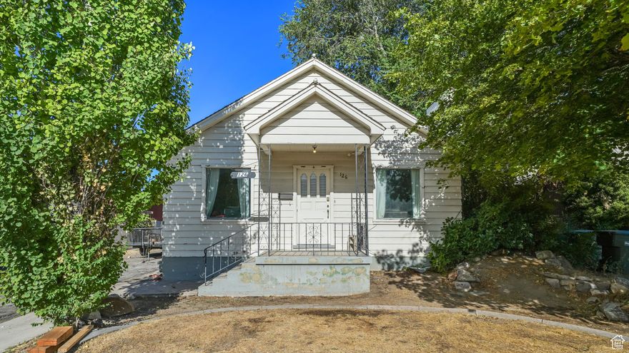 Located just steps from the heart of American Fork, this 2-bedroom, 1-bath bungalow offers both cozy living and exceptional investment potential. Built in 1942, the home features 780 sq ft above grade, a partially finished basement, and sits on a generous 8,194 sq ft lot.  Prime CC-2 Zoning opens the door to a variety of possibilities-maintain it as a charming residence, convert to a commercial space, or redevelop into a mixed-use property with retail, office, or residential above. Whether you're a homeowner seeking walkable convenience or an investor looking for flexible use, the location and zoning are a rare combination.  Enjoy a short stroll to local shops, restaurants, parks, and schools in the Alpine District. With quick access to I-15 and surrounding business districts, this property is ideally positioned for both lifestyle and growth. Buyer/Buyer's Agent to verify all information.
