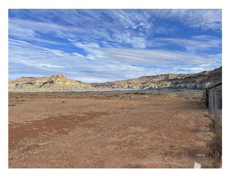 PRICE REDUCED.Discover the perfect canvas for your next venture with this expansive 2.9-acre property located in the growing community of Big Water, Utah. Ideally situated parallel to the highway, this lot offers unmatched visibility and accessibility, making it an excellent choice for a commercial development or any dream project you envision.  Utilities are conveniently located on the adjacent lot, streamlining your development process.  Big Water is a gateway to some of the region's most stunning attractions. Just 14 miles from the Lake Powell launch at Wahweap, AZ, and 57 miles from Kanab, UT, this property is surrounded by world-renowned destinations, offering limitless potential for tourism-driven ventures. With breathtaking sandy landscapes and incredible outdoor experiences in every direction, this property promises both opportunity and inspiration.  Don't miss the chance to make your mark in this dynamic and growing area.
